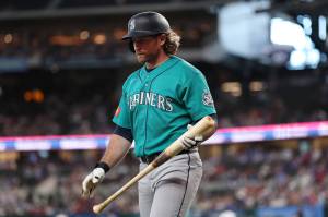 Brendan Donovan of the Seattle Mariners walks to the dugout following a strikeout during the first inning against the Texas Rangers at Globe Life Field on Wednesday, April 8, 2026, in Arlington, Texas. (Stacy Revere / Getty Images / Tribune News Services)