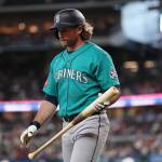 Brendan Donovan of the Seattle Mariners walks to the dugout following a strikeout during the first inning against the Texas Rangers at Globe Life Field on Wednesday in Arlington, Texas. (Stacy Revere / Getty Images / Tribune News Services)