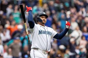Josh Naylor (12) of the Seattle Mariners reacts after hitting a two-run home run during the third inning against the Houston Astros at T-Mobile Park on Monday, April 13, 2026, in Seattle, Washington. (Maddy Grassy / Getty Images / Tribune News Services)