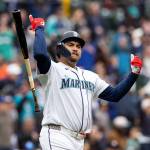 Josh Naylor (12) of the Seattle Mariners reacts after hitting a two-run home run during the third inning against the Houston Astros at T-Mobile Park on Monday in Seattle. (Maddy Grassy / Getty Images / Tribune News Services)