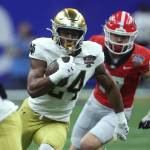 Notre Dames Jadarian Price (24) runs with the ball during the third quarter against Georgia during the Sugar Bowl at Caesars Superdome on Jan. 2, 2025, in New Orleans. (Chris Graythen / Getty Images / Tribune News Services)