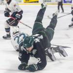 Lukas Kaplan #12 of the Everett Silvertips dives over Nate Corbet #22 of the Kelowna Rockets during Game 5 of the Western Hockey League second round on Friday, April 17, 2026 in Everett, Washington. (Olivia Vanni / The Herald)