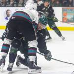 Jesse Heslop #22 of the Everett Silvertips is held down by Keith McInnis #2 of the Kelowna Rockets during Game 5 of the Western Hockey League second round on Friday, April 17, 2026 in Everett, Washington. (Olivia Vanni / The Herald)