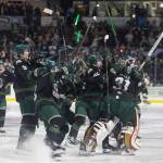 Landon DuPont #9 of the Everett Silvertips and Anders Miller #31 of the Everett Silvertips, along with other teammates, celebrate after beating the Kelowna Rockets in Game 5 of the Western Hockey League second round to advance to the Western Conference Finals on Friday, April 17, 2026 in Everett, Washington. (Olivia Vanni / The Herald)
