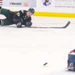 Rhys Jamieson #25 of the Everett Silvertips falls to the ice after shooting the puck during Game 5 of the Western Hockey League second round against the Kelowna Rockets on Friday, April 17, 2026 in Everett, Washington. (Olivia Vanni / The Herald)