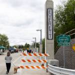 A person steps onto the new Edgewater Bridge from the Mukilteo side on Monday, April 27, 2026, in Everett, Washington. (Olivia Vanni / The Herald)