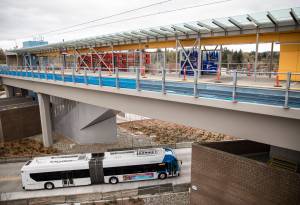 Olivia Vanni / The Herald
A Community Transit bus drives underneath the Lynnwood Light Rail station in Lynnwood.
