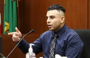 Andy Bronson / The Herald
Claiming a man pointed a gun at him, Kevin Rodriguez testifies in court at the Snohomish County Courthouse on Thursday, June 10, 2021, in Everett.