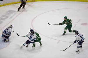 Silvertips forward Jaxsin Vaughan sends a shot past Penticton goalie Andrew Reyelts to extend Everetts lead to 2-0 late in the second period of a 4-1 win in Game 1 of the WHL Western Conference Finals at Angel of the Winds Arena on April 23, 2026. (Joe Pohoryles / The Herald)