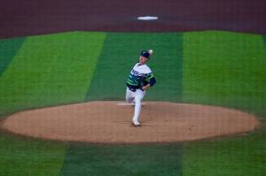 Mariners pitcher Bryce Miller begins his delivery on a pitch during a rehab assignment with the Everett AquaSox at Everett Memorial Stadium on April 24, 2026. (Joe Pohoryles / The Herald)