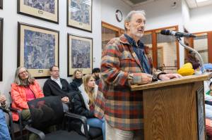 Allen Gibbs, a Mill Creek resident and former Pilchuck Audubon Society Conservation Chair, speaks during a Mill Creek City Council meeting in favor of the city acquiring the Penny Creek Natural Area on Tuesday, April 28, 2026 in Mill Creek, Washington. (Olivia Vanni / The Herald)