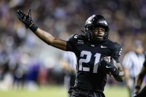 TCU safety Bud Clark (21) celebrates after getting an interception on Colorado quarterback Kaidon Salter (3) in the first half of an NCAA football game between TCU and Colorado at Amon G. Carter Stadium in Fort Worth on Saturday, Oct. 4, 2025. (Christopher Torres / Tribune News Services)