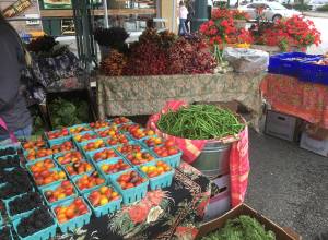 Everett Farmers Market bounty at its downtown location is seen in 2019. (Sue Misao / Herald file)