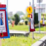A photograph of Kyle Van Jones is displayed along with 18 other photographs of missing and murdered Indigenous people at a roundabout along Marine Drive North and Tulalip Road on Monday, May 4, 2026 in Tulalip, Washington. (Olivia Vanni / The Herald)