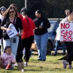People gather to listen to speakers during a rally in honor of missing and murdered Indigenous people on Tuesday, May 5, 2026, in Tulalip, Washington. (Olivia Vanni / The Herald)