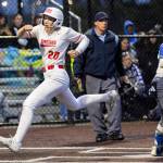 Stanwoods Addi Anderson yells as she crosses home plate to score the go-ahead run during the 3A District 1 championship game against Sedro-Woolley on Thursday, May 15, 2025 in Everett. (Olivia Vanni / The Herald)