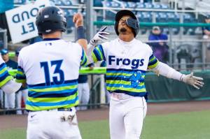 Curtis Washington Jr. (right) of the Everett AquaSox approaches home plate after hitting a home run against the Hillsboro Hops on Tuesday, May 5, 2026 at Everett Memorial Stadium. (Photo courtesy of Shari Sommerfeld / Everett AquaSox)