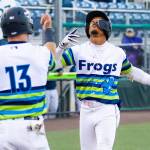 Curtis Washington Jr. (right) of the Everett AquaSox approaches home plate after hitting a home run against the Hillsboro Hops on Tuesday at Everett Memorial Stadium. (Photo courtesy of Shari Sommerfeld / Everett AquaSox)