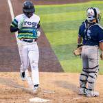 Felnin Celesten #5 of the Everett AquaSox scores during the game against the Hillsboro Hops on Wednesday, May 6, 2026 in Everett, Washington. (Olivia Vanni / The Herald)