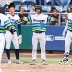 Austin St. Laurent, Anthony Donofrio and Jonny Farmelo celebrate Carter Dorighi as he crosses home plate after hitting a home run during the game against the Hillsboro Hops on Wednesday, May 6, 2026 in Everett, Washington. (Olivia Vanni / The Herald)