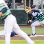 The AquaSox attempt a pickoff on Wednesday, May 6, 2026 in Everett, Washington. (Olivia Vanni / The Herald)