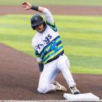 Austin St. Laurent #13 of the Everett AquaSox slides into third base during the game against the Hillsboro Hops on Wednesday, May 6, 2026 in Everett, Washington. (Olivia Vanni / The Herald)