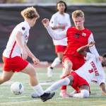 Mountlake Terraces Abdalaziz Alhaj Mussa slide tackles Snohomishs Kason Bringedahl during the loser-out 3A district playoff game on Thursday, May 7, 2026 in Snohomish, Washington. (Olivia Vanni / The Herald)