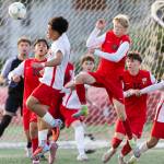 Mountlake Terraces Tien Tieu and Snohomishs Mitch Mitchell jump to head a corner kick during the loser-out 3A district playoff game on Thursday, May 7, 2026 in Snohomish, Washington. (Olivia Vanni / The Herald)