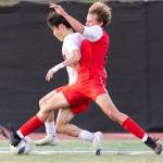 Mountlake Terraces Tyki Kobayashi and Snohomishs Chase Beazer battle for the ball during the loser-out 3A district playoff game on Thursday, May 7, 2026 in Snohomish, Washington. (Olivia Vanni / The Herald)