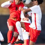 Snohomishs Brian Flores Machuca and Mountlake Terraces Rafeal Tewolde jump to head the ball during the loser-out 3A district playoff game on Thursday, May 7, 2026 in Snohomish, Washington. (Olivia Vanni / The Herald)