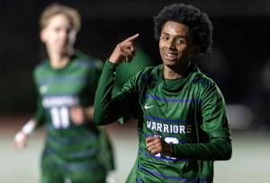 Edmonds-Woodway’s Natan Ghebreamlak reacts after scoring his third goal during the game against Archbishop Murphy on Tuesday, March 31, 2026 in Edmonds, Washington. (Olivia Vanni / The Herald)