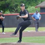 Jacksons Austin Halvorson pitches against Woodinville in a 4A District 1-2 playoff game at Bannerwood Park in Bellevue on Saturday. (Aaron Coe / The Herald)