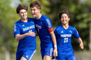 Shorewoods Nikola Genadiev and Shorewoods Daniel Bruno celebrate after Genadievs goal during the 3A district semifinal game against Lynnwood on Tuesday, May 12, 2026 in Shoreline, Washington. (Olivia Vanni / The Herald)