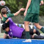 Edmonds-Woodways Isaiah Zabel and Shorecrests Ashton Johnson collide in the goal box during the 3A district semifinal game on Tuesday, May 12, 2026 in Shoreline, Washington. (Olivia Vanni / The Herald)