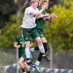Edmonds-Woodways Jonah Sutcliffe and Shorecrests Cole Ambrose jump up to head the ball during the 3A district semifinal game on Tuesday, May 12, 2026 in Shoreline, Washington. (Olivia Vanni / The Herald)