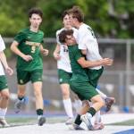 Edmonds-Woodways Mason Clark and Shorecrests Kai Short collide during the 3A district semifinal game on Tuesday, May 12, 2026 in Shoreline, Washington. (Olivia Vanni / The Herald)