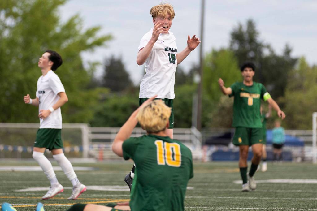 Edmonds-Woodways Jonah Sutcliffe reacts after he is called for a foul on Shorecrests Cole Ambrose during the 3A district semifinal game on Tuesday, May 12, 2026 in Shoreline, Washington. (Olivia Vanni / The Herald)