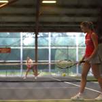 Stanwoods Addison Bowie prepares to serve during the District 1 3A doubles title match against Snohomish on Wednesday, May 13, 2026 at Skagit Valley College in Mount Vernon. (Qasim Ali / The Herald)