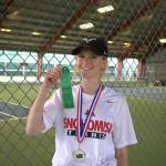 Snohomishs Mak Dauer poses with her medal and ribbon after winning the District 1 3A singles title on Wednesday, May 13, 2026 at Skagit Valley College in Mount Vernon. (Qasim Ali / The Herald)