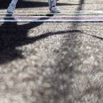 A batter at home plate casts a shadow during the 3A district championship between Sedro-Woolley and Everett on Thursday, May 14, 2026 in Everett, Washington. (Olivia Vanni / The Herald)