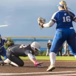 Everetts Alyssa Iverson is tagged while diving back to first base during the 3A district championship game against Sedro-Woolley on Thursday, May 14, 2026 in Everett, Washington. (Olivia Vanni / The Herald)