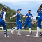 Sedro-Woolley players react after beating Everett in the 3A district championship game on Thursday, May 14, 2026 in Everett, Washington. (Olivia Vanni / The Herald)