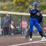 Shorewoods Alyssa Carver reacts after getting to third base during the 3A district loser-out game against Snohomish on Thursday, May 14, 2026 in Everett, Washington. (Olivia Vanni / The Herald)