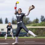 Stanwoods Addi Anderson pitches during the 3A district loser-out game against Meadowdale on Thursday, May 14, 2026 in Everett, Washington. (Olivia Vanni / The Herald)