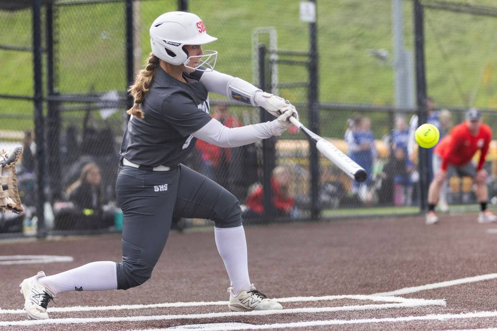 Stanwoods Jordan Rancourt hits a two-run home run during the 3A district loser-out game against Meadowdale on Thursday, May 14, 2026 in Everett, Washington. (Olivia Vanni / The Herald)