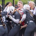 Stanwoods Jordan Rancourt celebrates her home run with her teammates during the 3A district loser-out game against Meadowdale on Thursday, May 14, 2026 in Everett, Washington. (Olivia Vanni / The Herald)