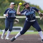 Meadowdales Lillian McCormick throws the ball to first base during the 3A district loser-out game against Stanwood on Thursday, May 14, 2026 in Everett, Washington. (Olivia Vanni / The Herald)