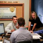 Everett Police Department recruits (from left) Michael Phillips, Brett Janke, Ora Evans and John Dorscher work to complete their FEMA certifications at the department headquarters in downtown Everett on June 14.                                (Ian Terry / The Herald)