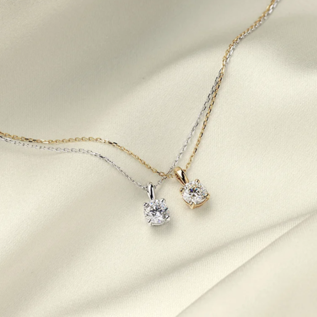 layered yellow and whit egold diamond necklaces